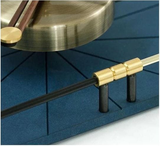 Copper art capsule wall clock blue view 2