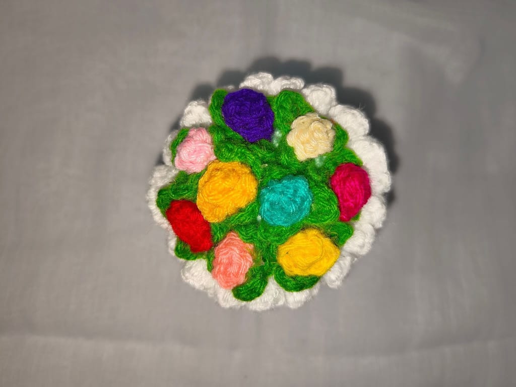 Hand crocheted mini flower bouquet in a vase view 2