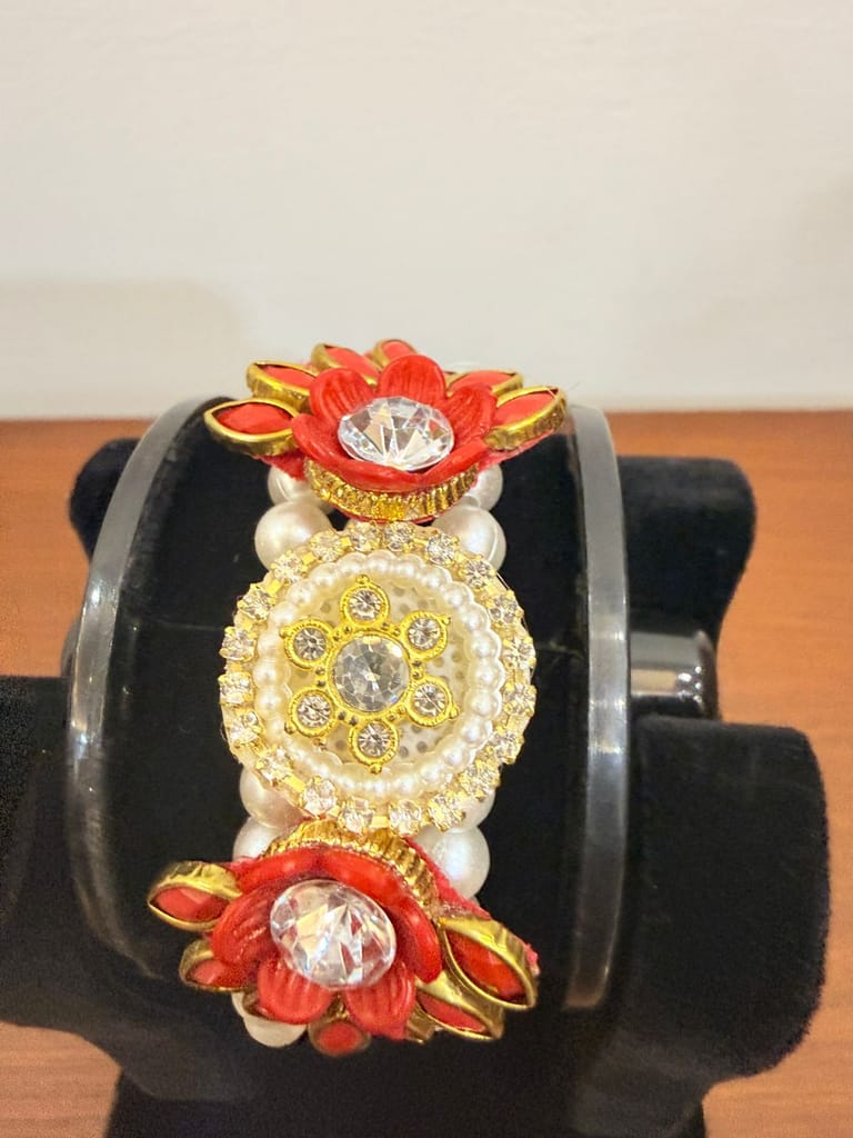 vibrant red floral moti pearl bracelet centered with shiny crystal stones view 2