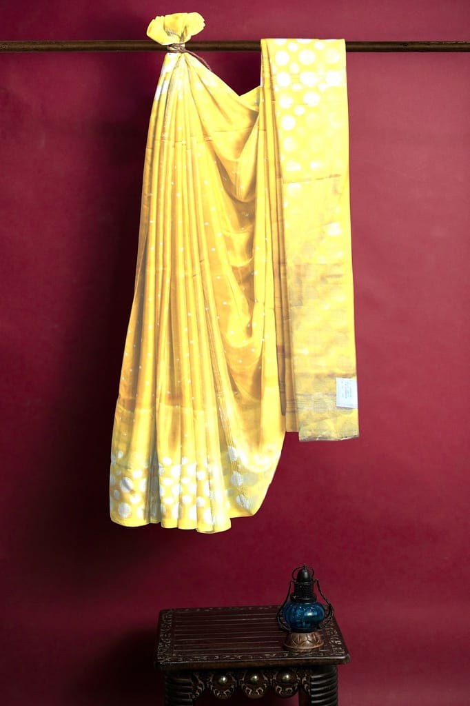 A Handloom Saree On A Yellow Base view 2