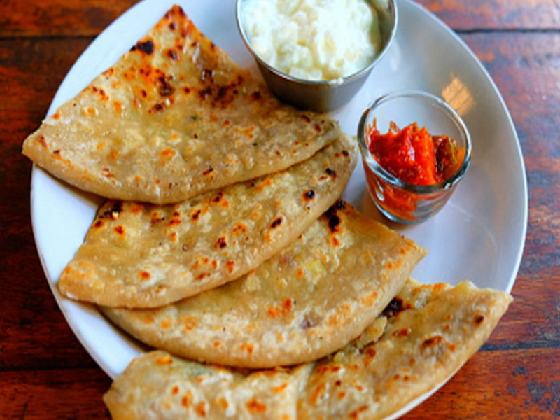 2 aloo parantha with raita and pickle
