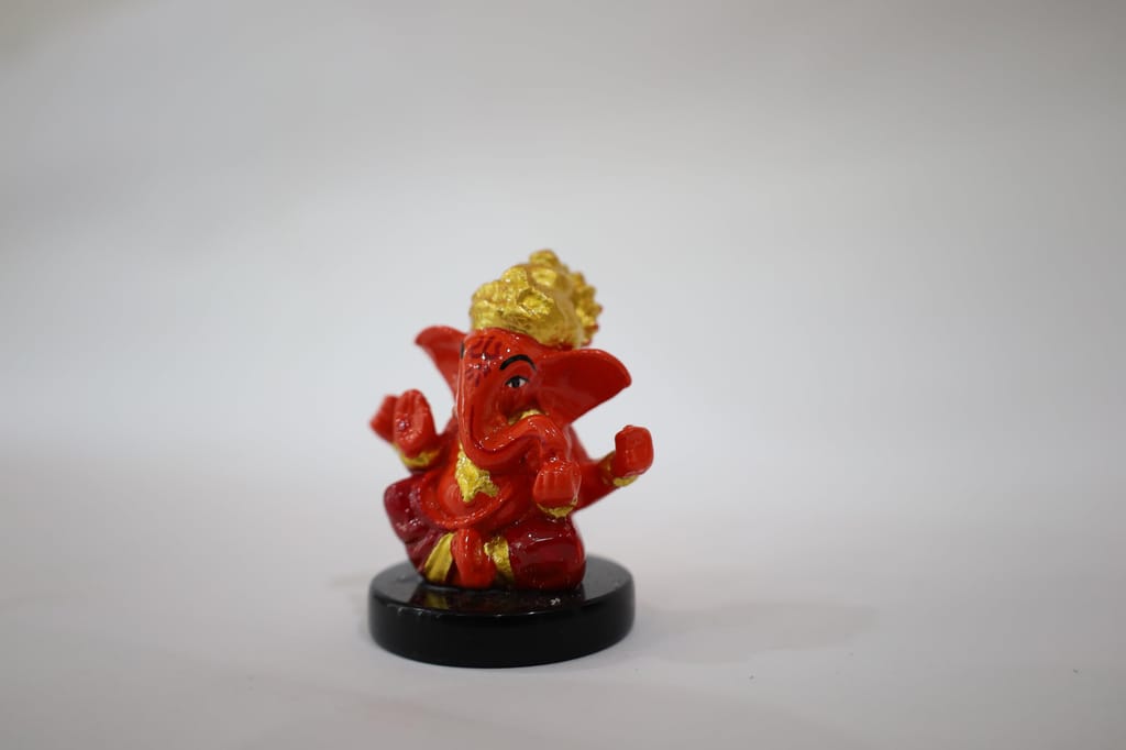 Red and Gold Ganesha Decorative Statue with Black Base, Hindu Deity Figurine, Handcrafted Religious Art Piece view 2
