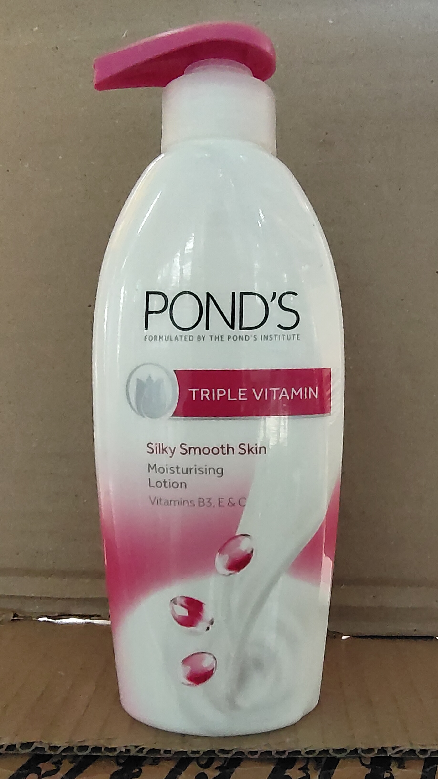 Ponds triple vitamin silky smooth skin body lotion
