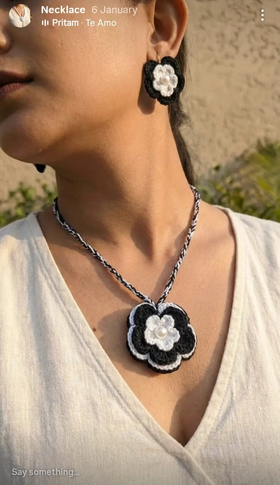 Simple crochet necklace set.Back and white colour flower and same design earrings. view 2