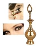Brass surmedani with surma use in eye's makeup view 2