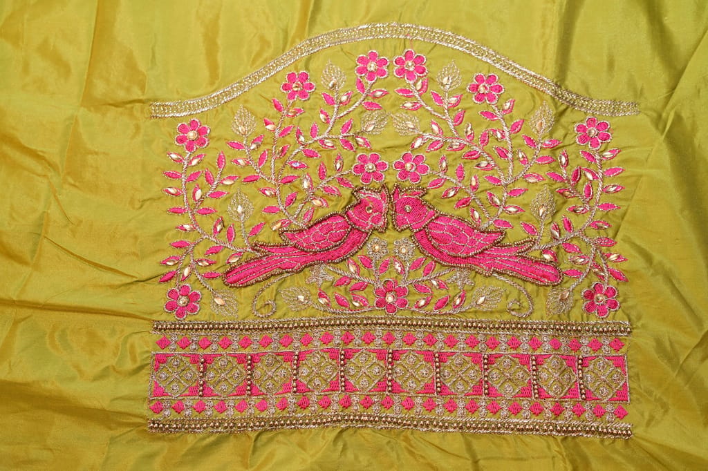 Green blouse with intricate embroidery and mirror work view 2