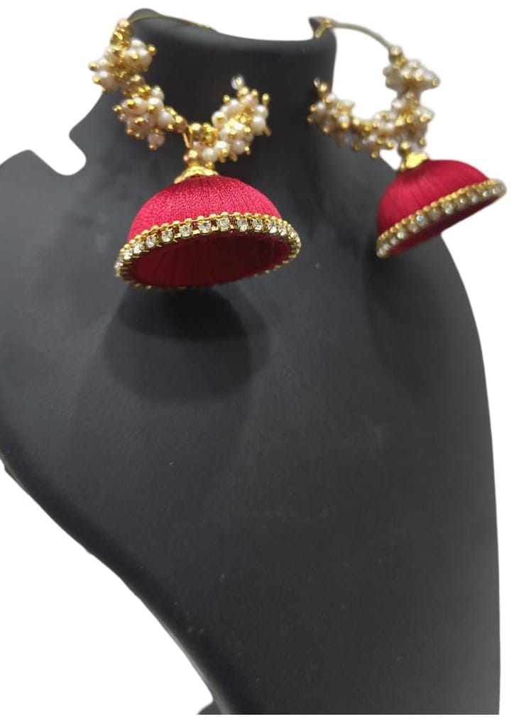 Red and gold jhumka earrings with pearl and kundan accents view 2