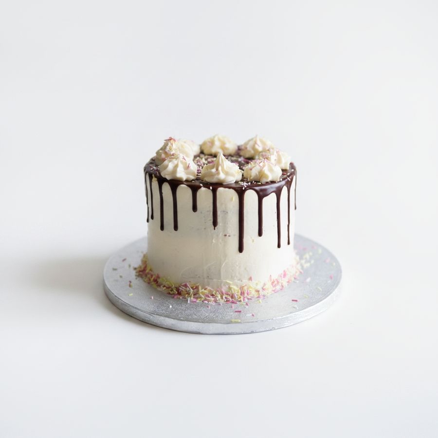Chocolate Drip Cake - 1 kg - One whole cake on a cardboard base view 2