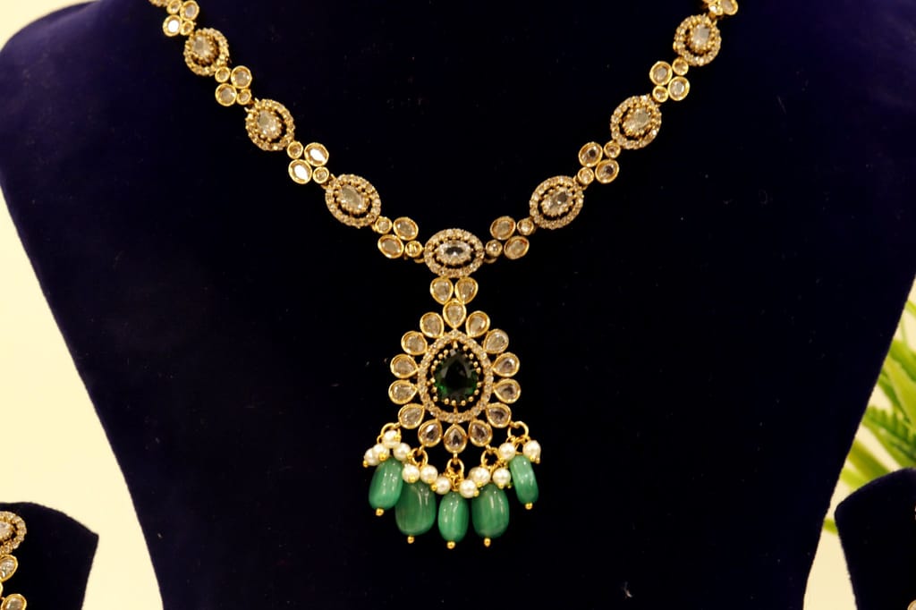 Gold-plated Kundan and Pearl Choker Necklace Set with Green Stones view 2