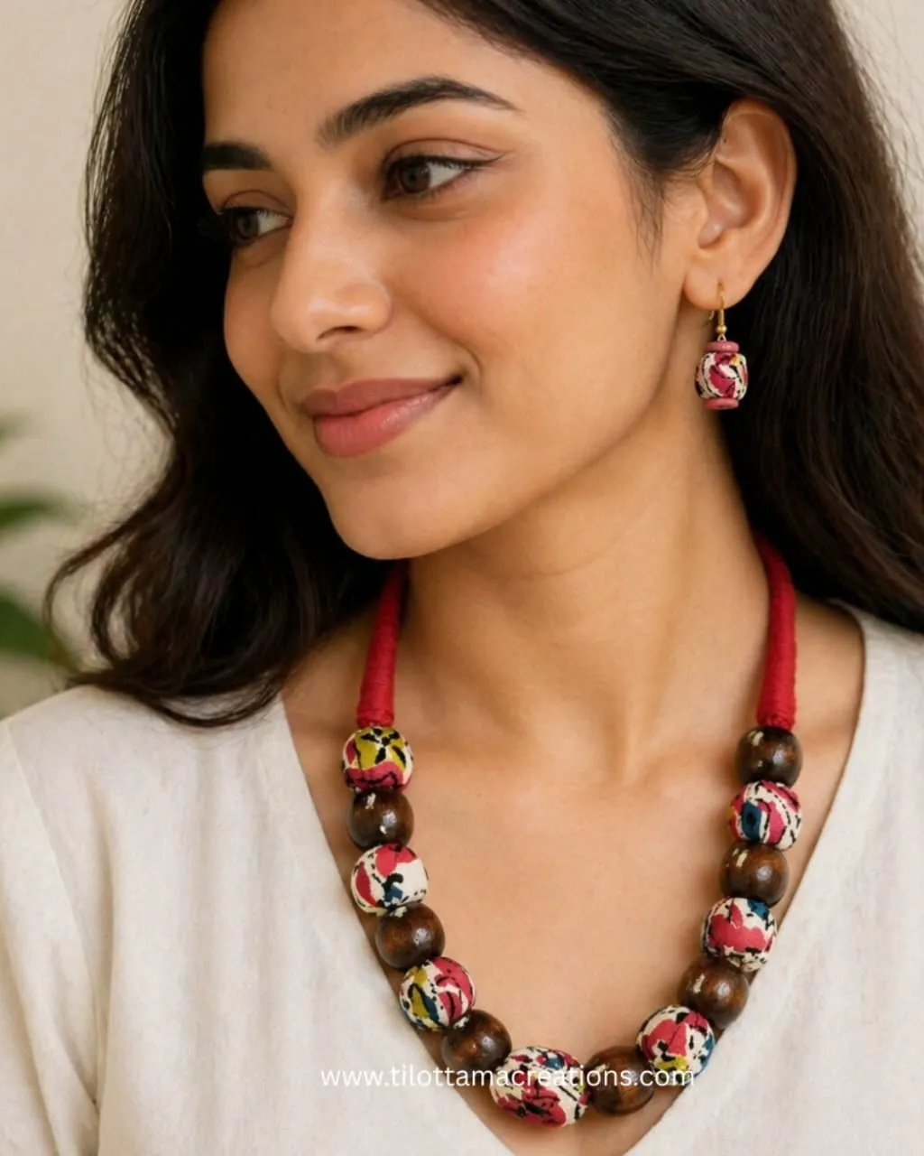 Handmade. Unique. Beautiful.Fabric bead necklace set with matching earrings crafted to make every outfit stand out. view 2