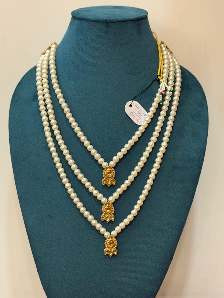 three-layer white moti pearl necklace with golden stone pendants view 2