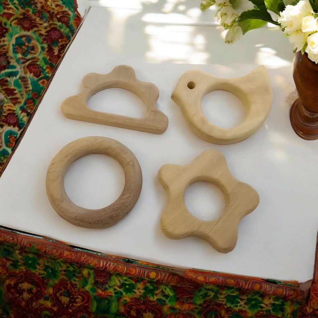 Neemtoys Pack of 4 Neem Wooden Teethers for Babies of Age 0 to 3 Years, Ring, Flower, Dove and Cloud Shapes Teether, Teething Toy for Babies with Multiple Textured Surface (Brown) view 2