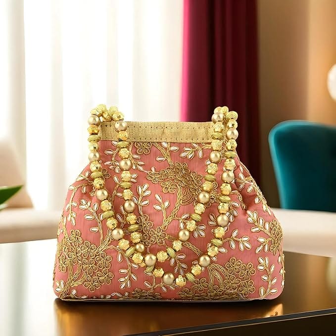 "Exquisite Hand Embroidered Silk Potli Bag with Pearl Beaded Drawstrings - Perfect for Special Occasions"
