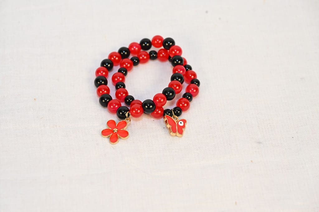 Red and black beaded charm bracelet view 2