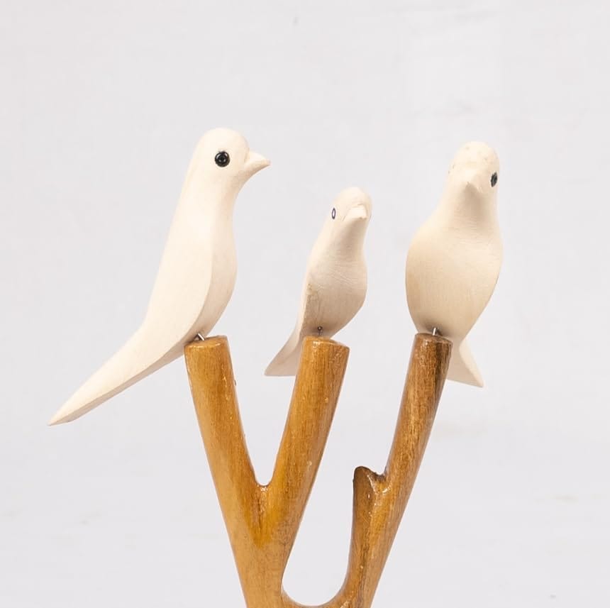 Three White Wooden Birds on a Branch view 2