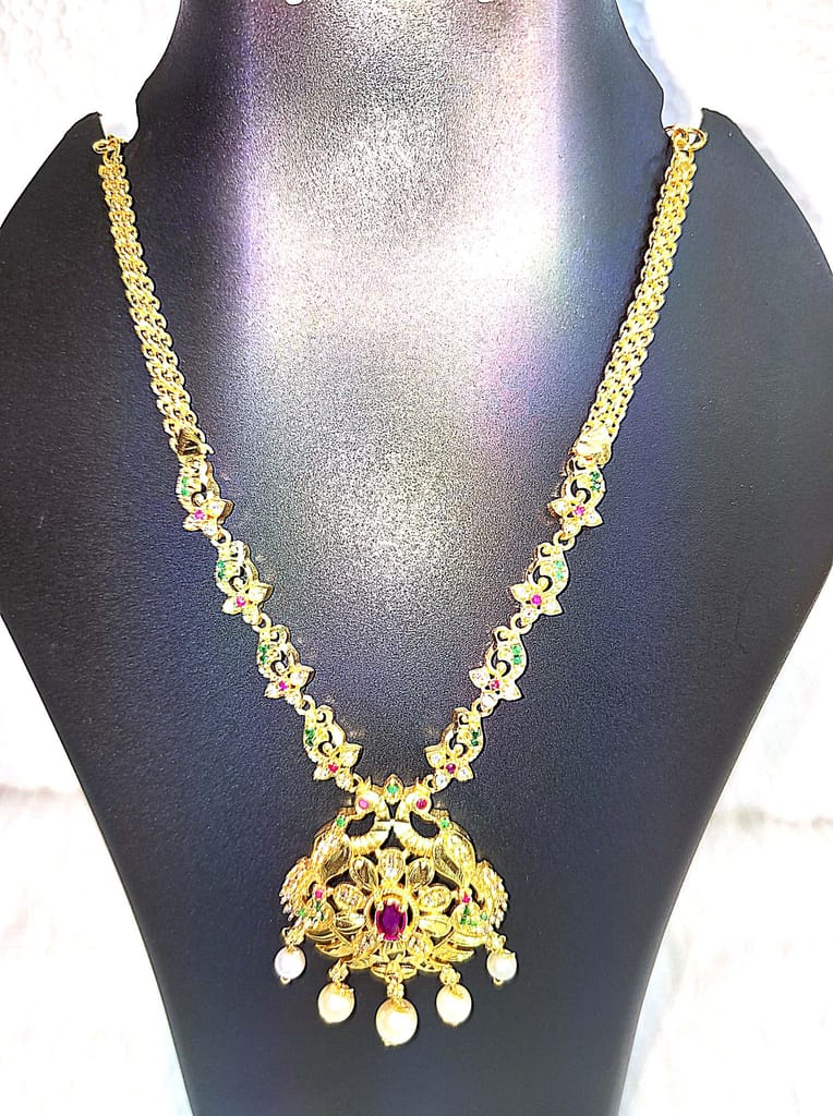 "Stunning Gold-Plated Necklace with Intricate Peacock Pendant and Pearl Drop Detailing" view 2