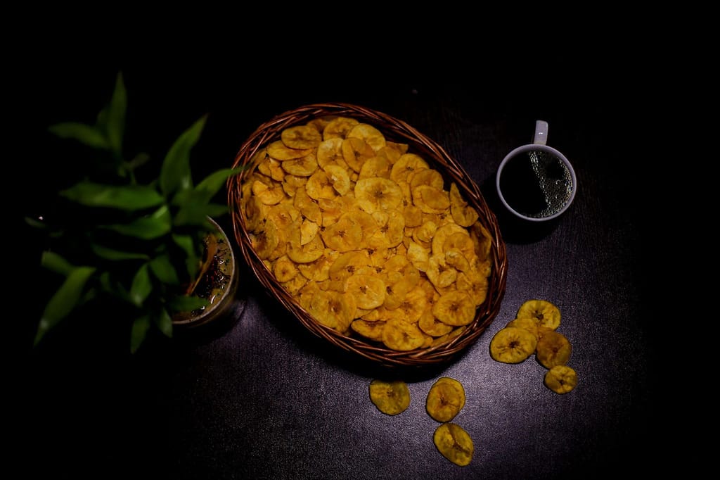 CRUNCHIZZ Authentic Kerala Style Yellow Banana Chips & Sesame Chikki White Combo I Traditional South Indian Recipe I No Artificial Additives I Perfect Munchy Bites I Pack of Two I 150 Grams Each I Total 300 Grams view 2