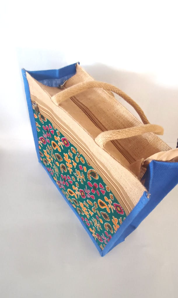 The title of the product could be "Jute Tote Bag with Colorful Floral Print and Blue Trim view 2
