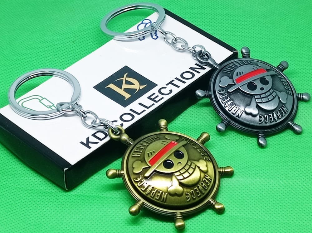 KD COLLECTIONS Combo of Anime Skull Ship Steering Wheel Revolving Rotating Keychain – Golden Grey Color – Pack of 2 Keychains view 2