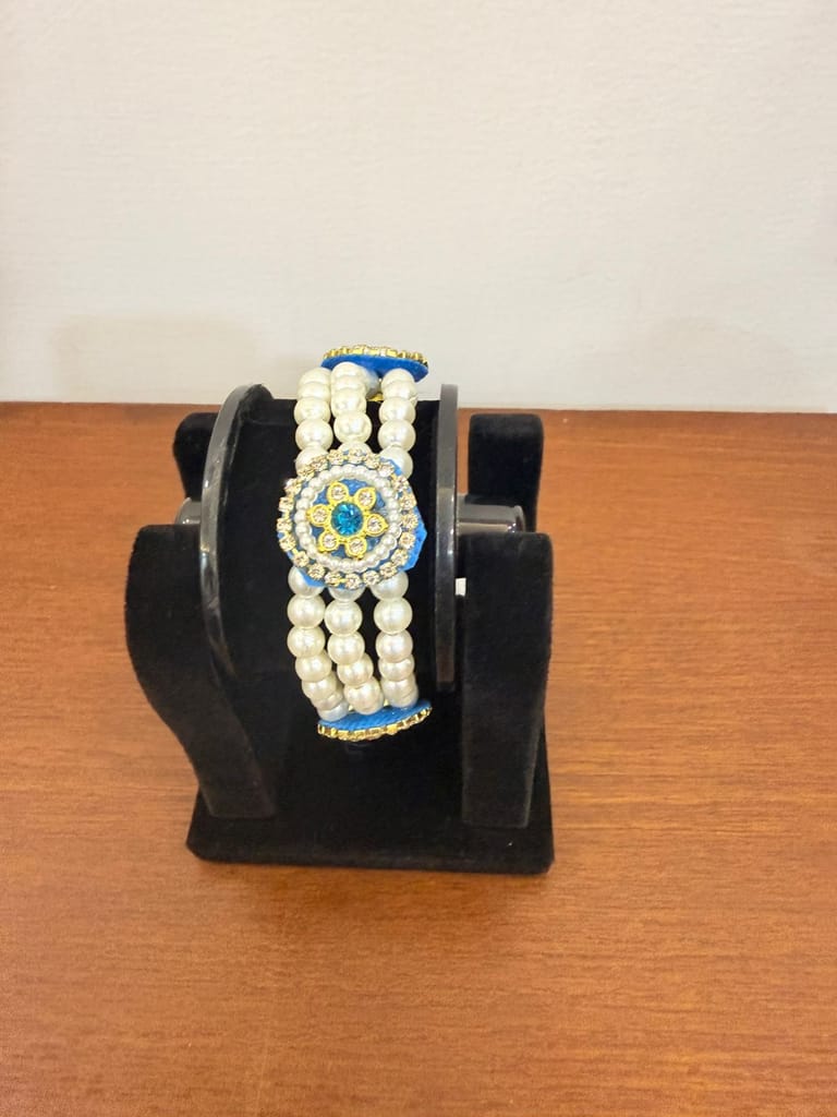 stretchable blue floral moti pear bracelet with crystal details