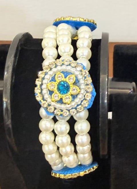 stretchable blue floral moti pear bracelet with crystal details view 2