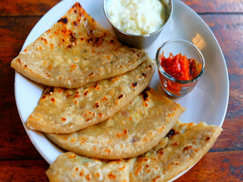 2 paneer parantha with raita and pickle