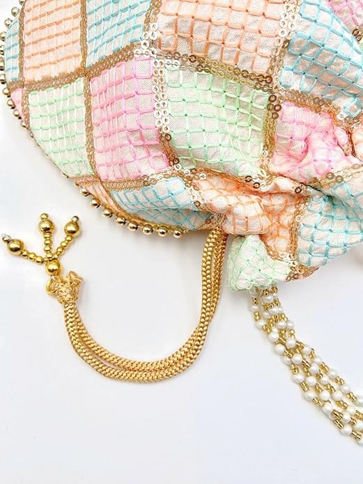 Potli Bag: Hand Embroidered Drawstring Bag with Pearl and Tassel Detail