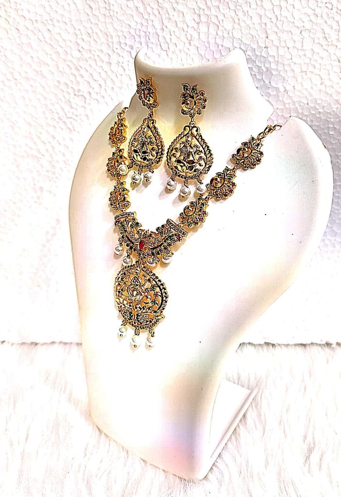 "Stunning Gold-Plated Necklace Set with Intricate Floral Design and Pearl Accents" view 2