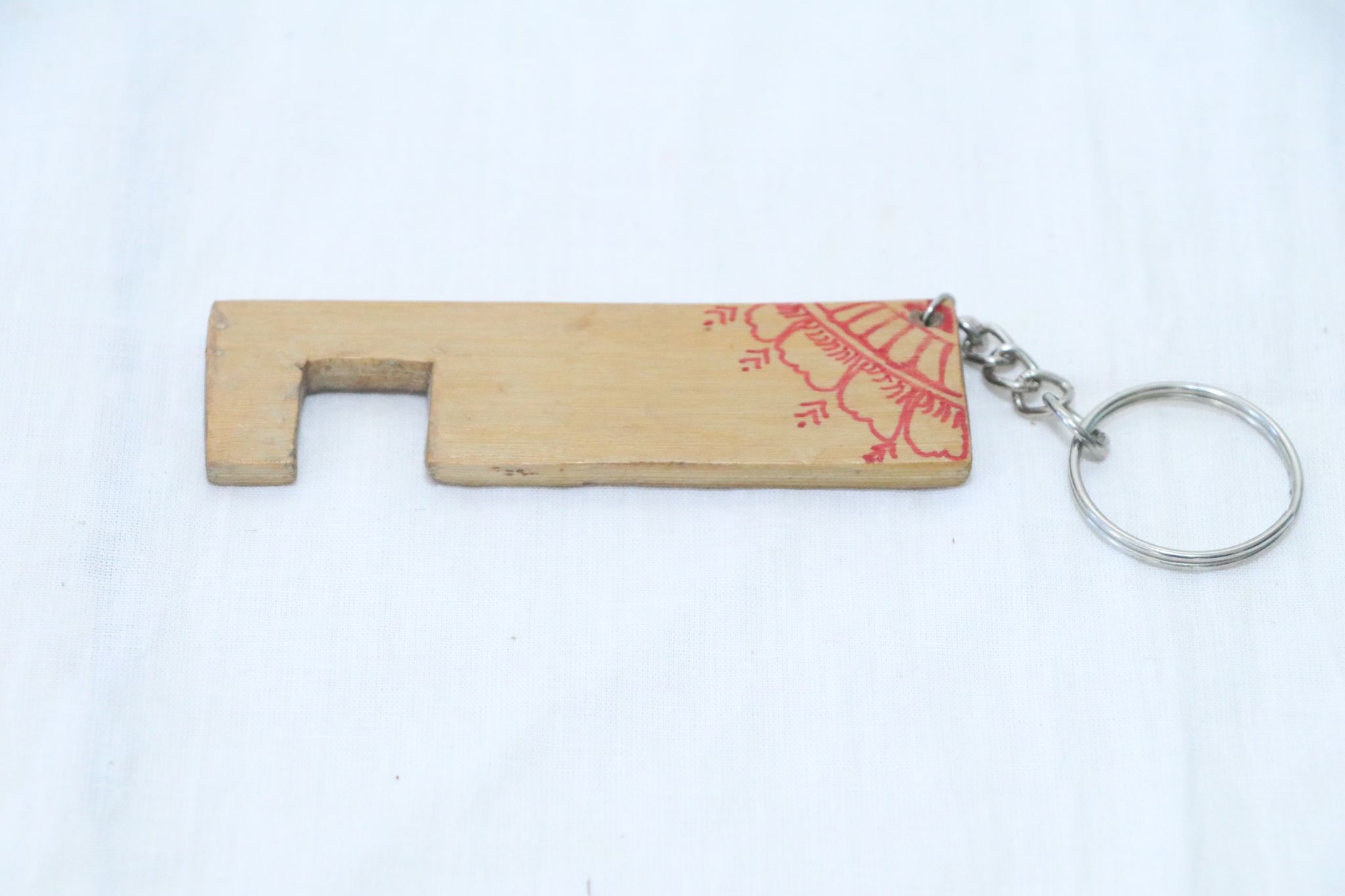 Artisan Wooden Keychain with Red Henna Design view 2