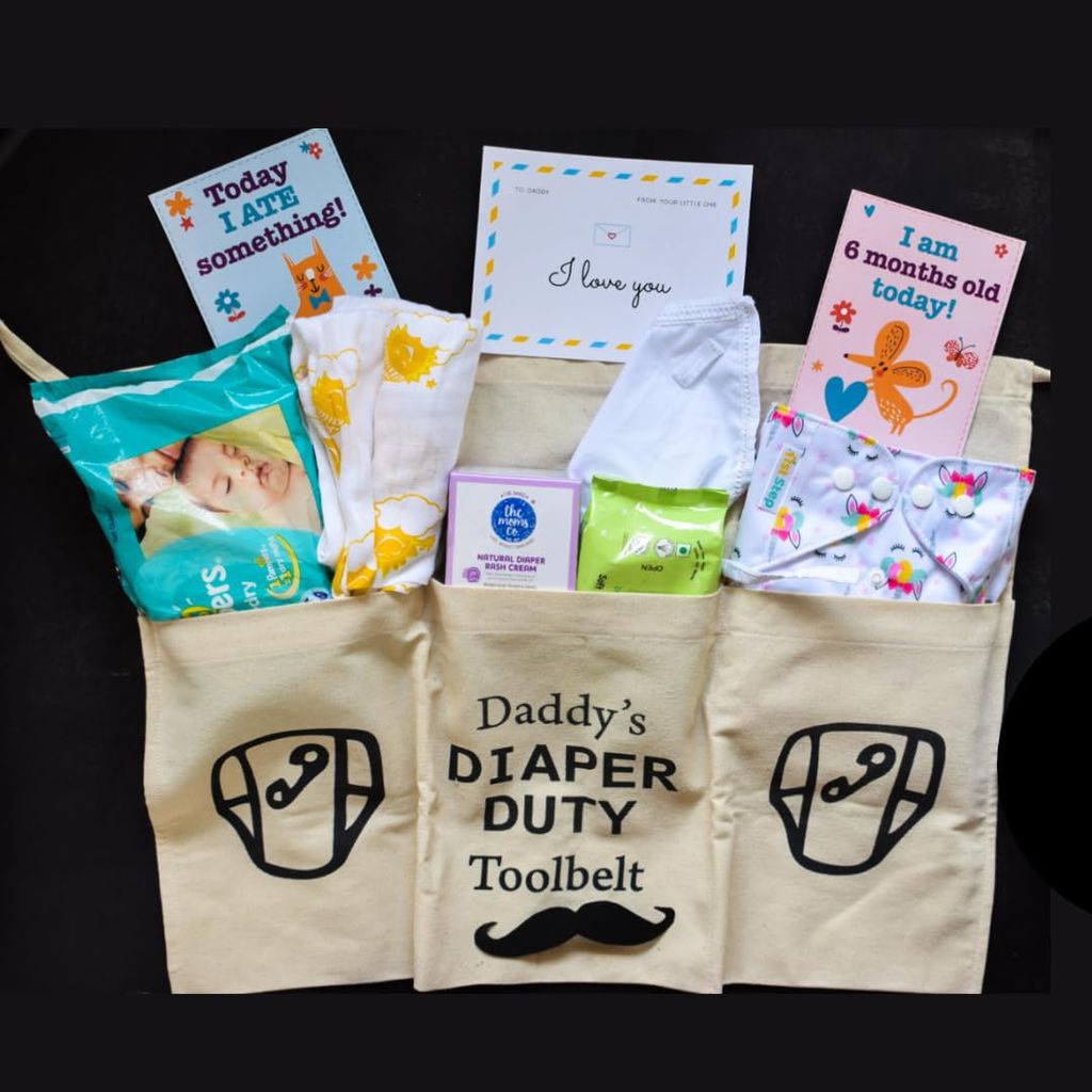 The Baby First Box Daddy's Duty Toolkit Gift For New Dads (Apron, Quick Dry Sheet, Disposable Diapers, Cotton Diapers For Babies, Diaper Rash Cream And 18 Milestone Cards),1 Count view 2