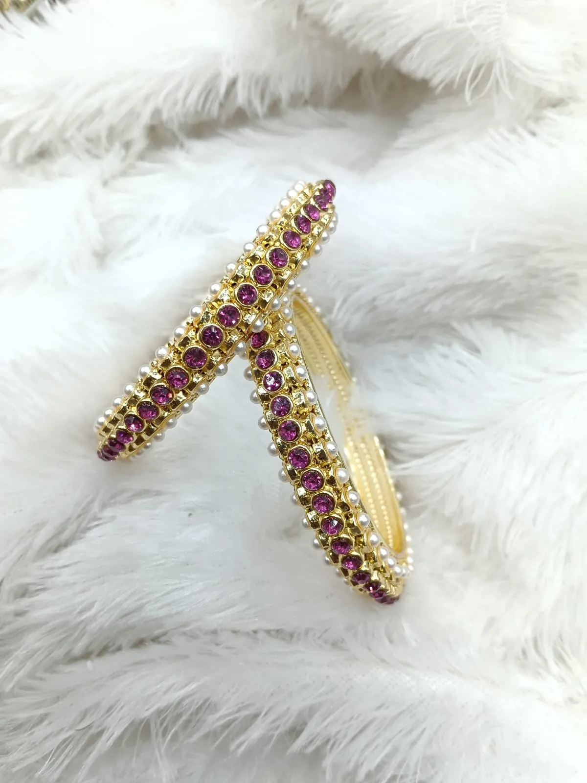 Moti kada with dark pink stone