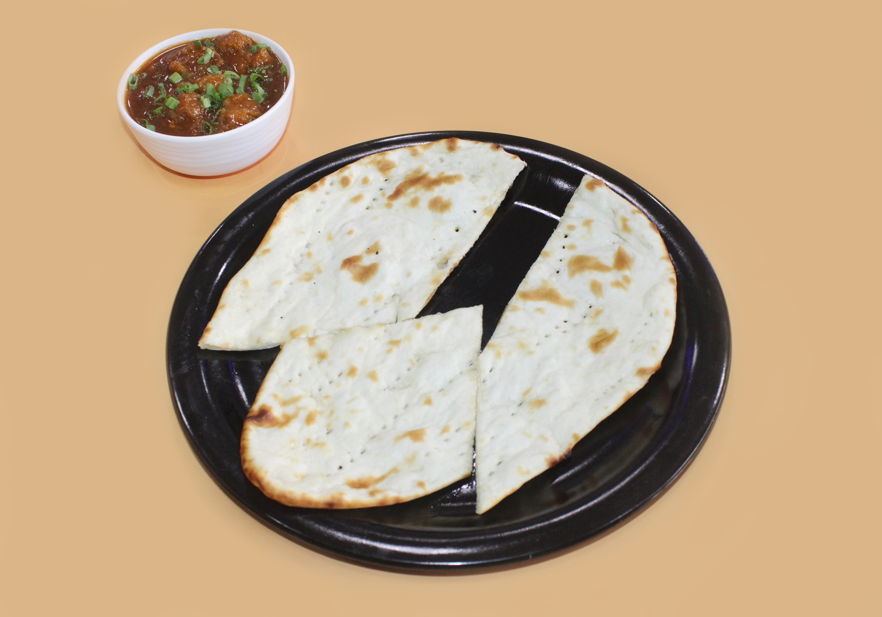 1 naan with gobi manchurian gravy [200 ml]