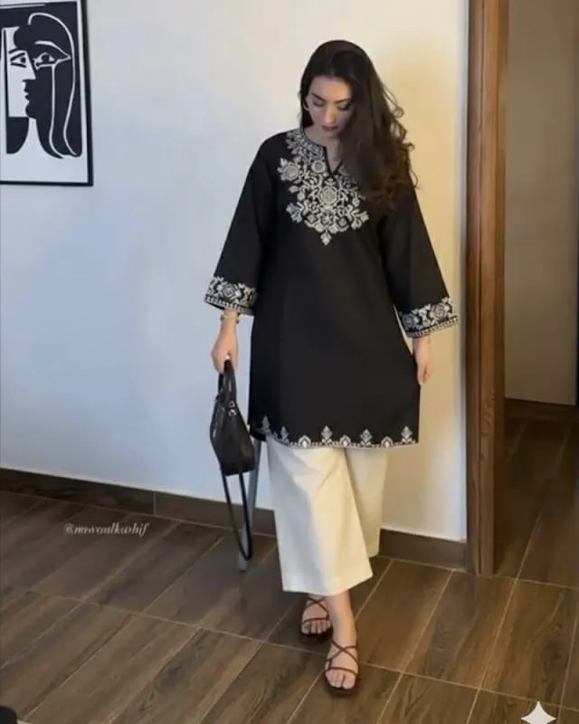 Black Embroidered Co-ord Set Step into effortless grace with our classic black cotton co-ord set. The lightweight kurta features intricate thread embroidery along the neckline, sleeves, and hemadding a refined touch to your look. Paired with soft, relaxed-fit palazzos, this breathable set is perfect for casual outings, festive events, or elegant daywear.