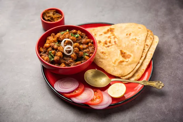 Any Paratha (sattu/wheat/panner/aloo) + Chole