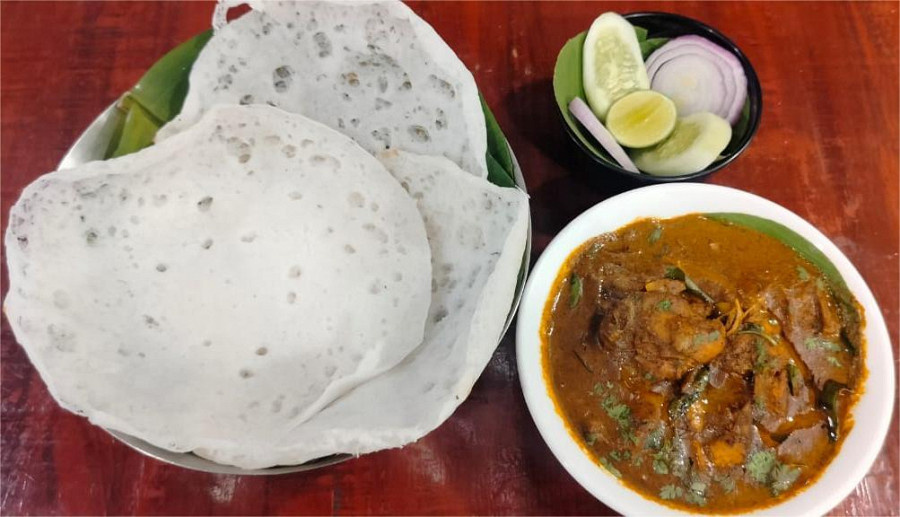 Appam with chicken curry and salad combo