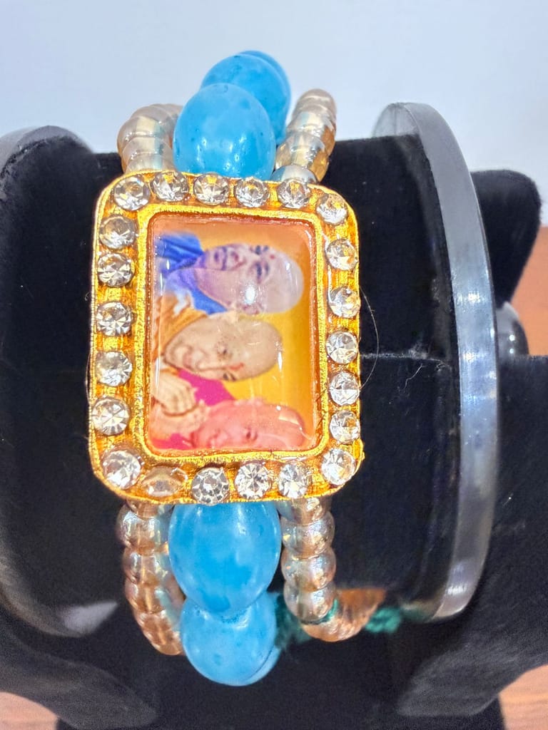 sacred unisex sky-blue moti pearl bracelet featuring a central guru ji photo view 2