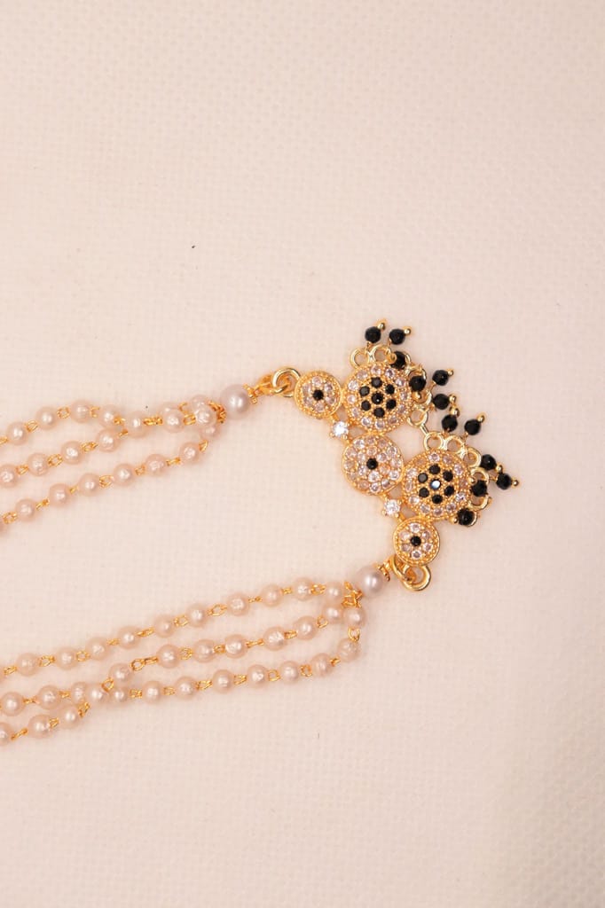 Pearl and gold haram with pendant view 2