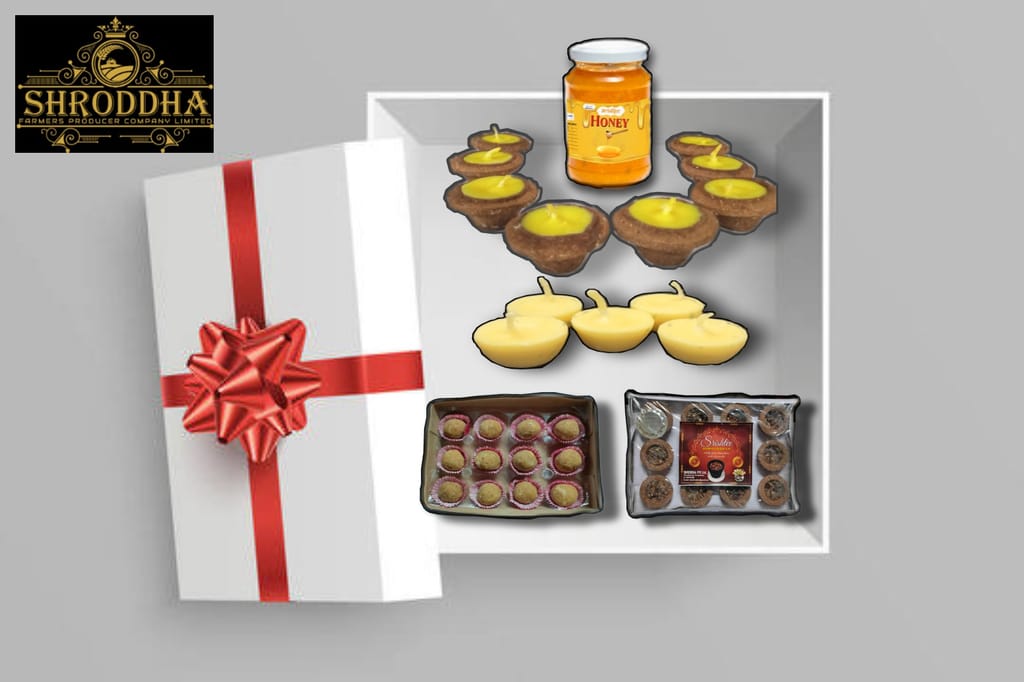 Srishtee Diwali Gift Pack (5 pcs Cowdung Diya with Ghee, 5 pcs Ghee Diya, 1 pkt Sambrani Dhoop Cup, 100 ml Honey, 12 pcs Millet Laddu) view 2