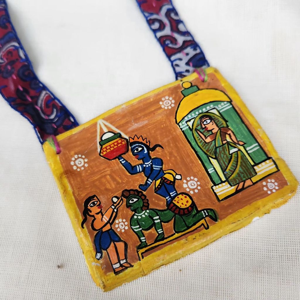 Handmade pendant necklace with hand painted Madhubani art pendant view 2
