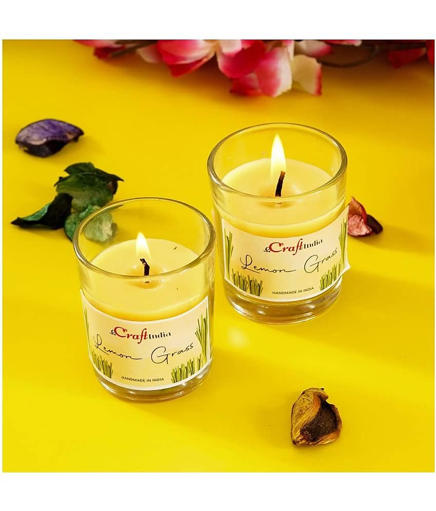 eCraftIndia Set of 2 Yellow Lemon Grass Scented Glass Candles view 2